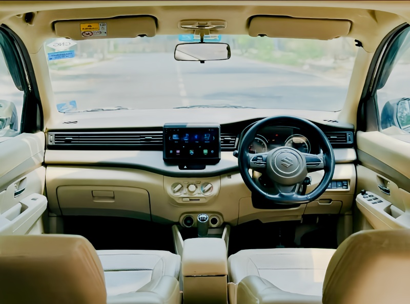 Ertiga cab dashboard and front passenger view for hire