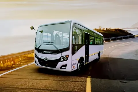 32-seater non-AC bus front view, available for group bus rental