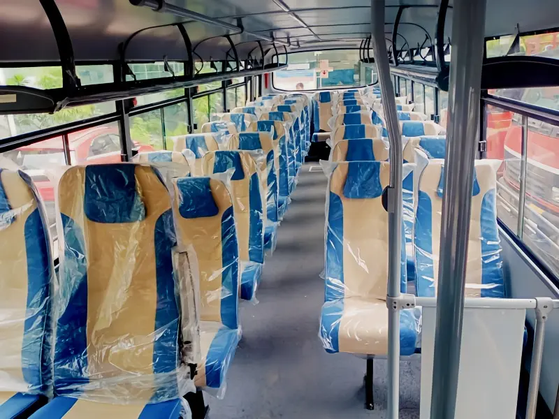 32-seater non-AC bus interior seating view for tour packages