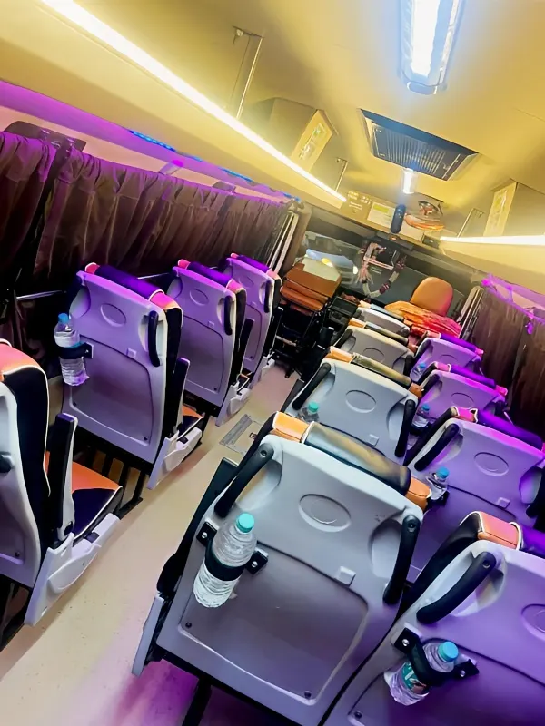 Interior view of 20-seater AC Tempo Traveller bus for rent