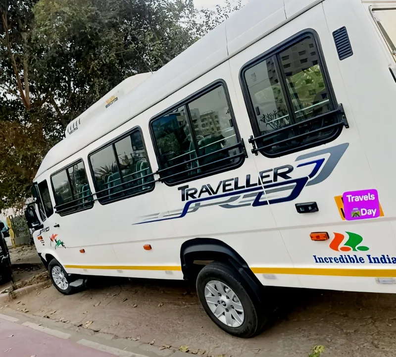 20-seater AC Tempo Traveller side profile view, ideal for corporate travel