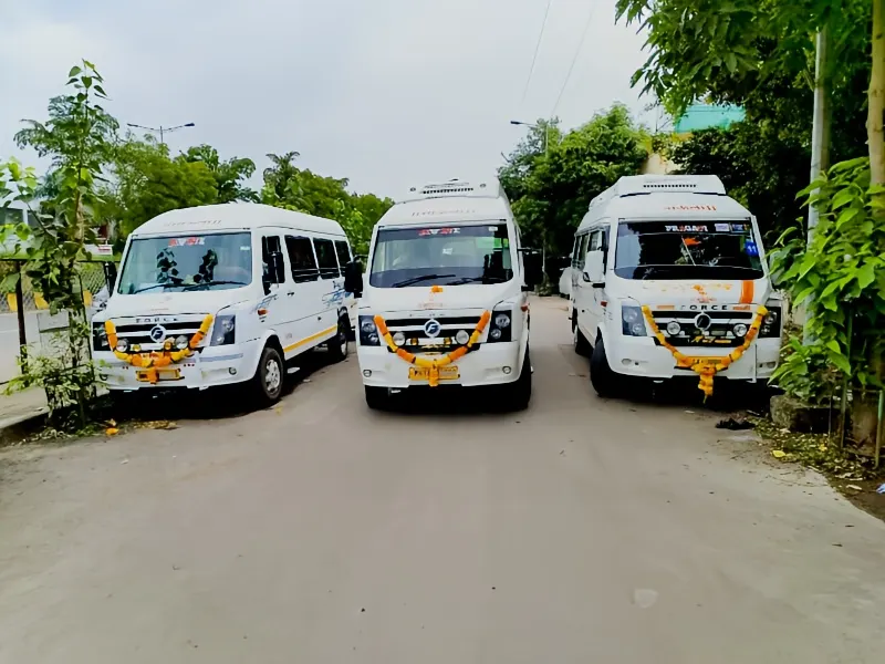Front view of 17-seater Tempo Traveller non-AC bus for group bookings