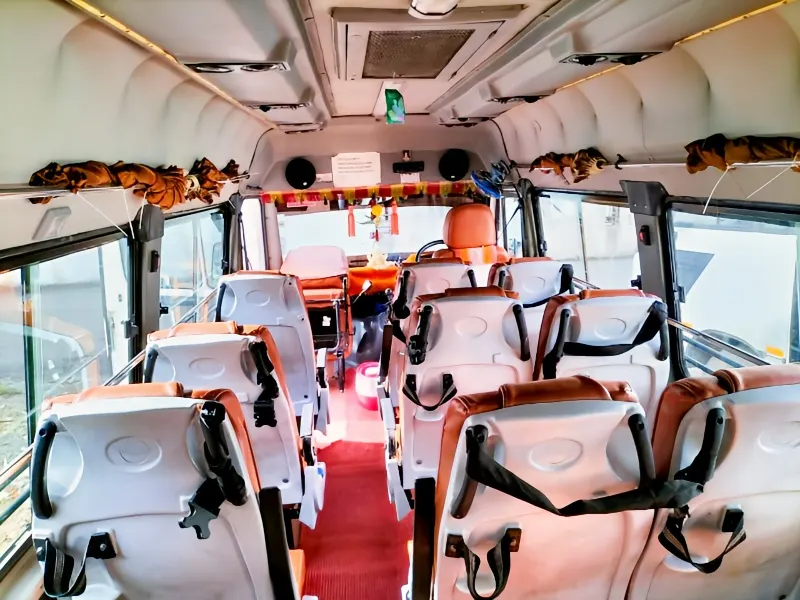 Non-AC Tempo Traveller interior cabin shot, ideal for sightseeing