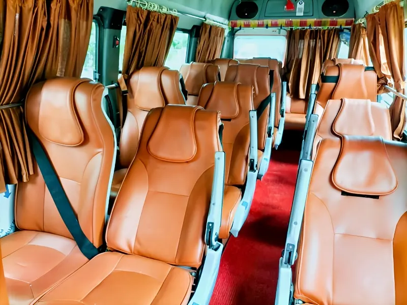Non-AC 17-seater Tempo Traveller interior seat view for tours